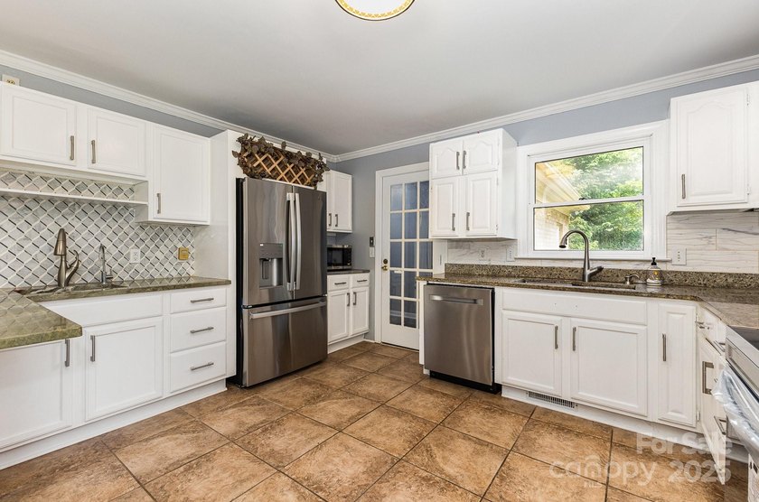 Stunning and spacious 4-bedroom, 2.5-bath home located in the - photo 11