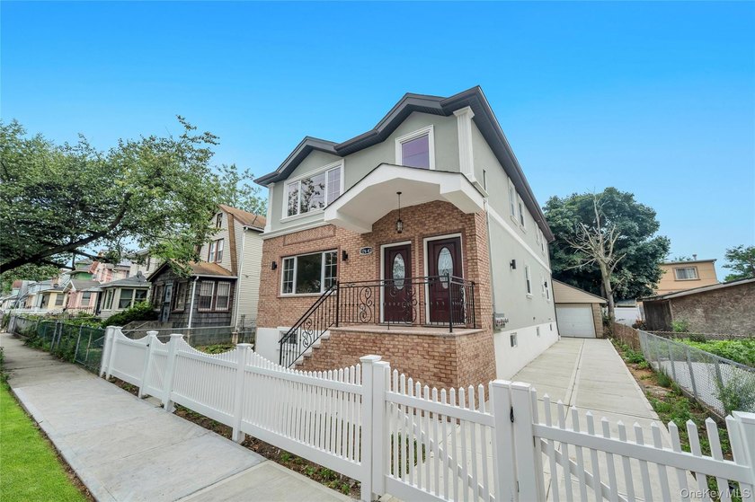 Introducing a stunning 2026-built legal two-family home situated - photo 2