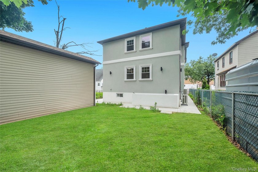 Introducing a stunning 2026-built legal two-family home situated - photo 6