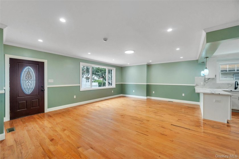 Introducing a stunning 2026-built legal two-family home situated - photo 10