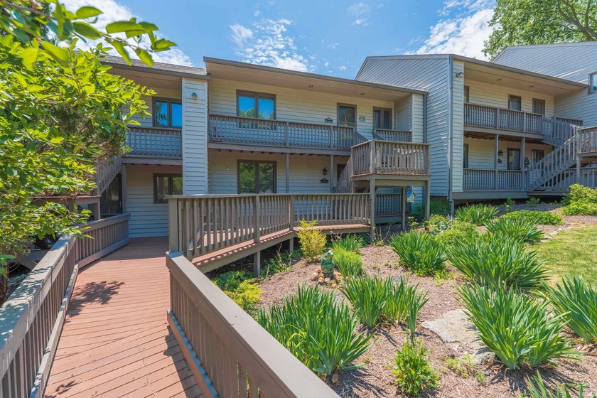 Enjoy this easily accessible first-floor Water's Edge 2-bedroom - photo 2
