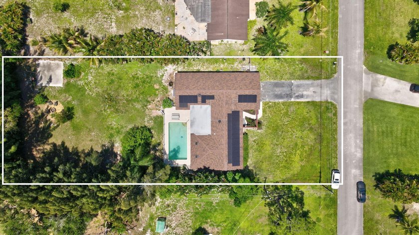 Welcome to this exceptional single-family home in the highly - photo 2