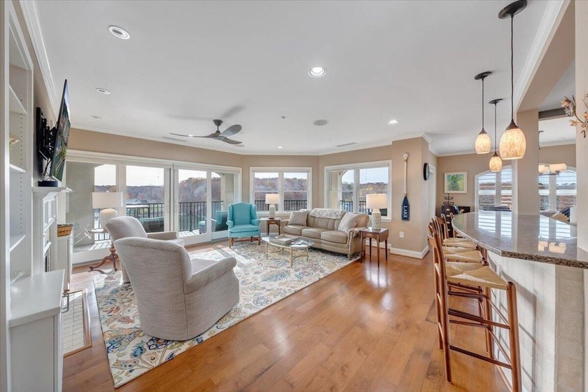 Discover lakeside luxury living with no maintenance with this - photo 3