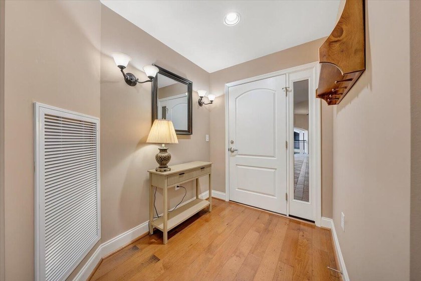 Discover lakeside luxury living with no maintenance with this - photo 7