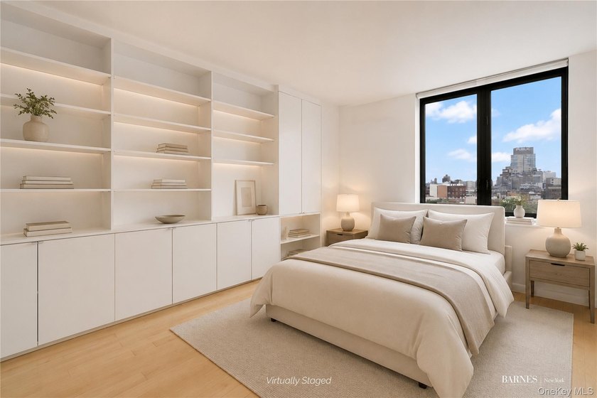 Perched on a high floor with breathtaking skyline views, this - photo 5