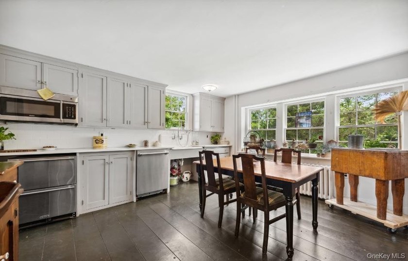 Welcome to 38 Landing Meadow Road, Smithtown. Nestled on almost - photo 6