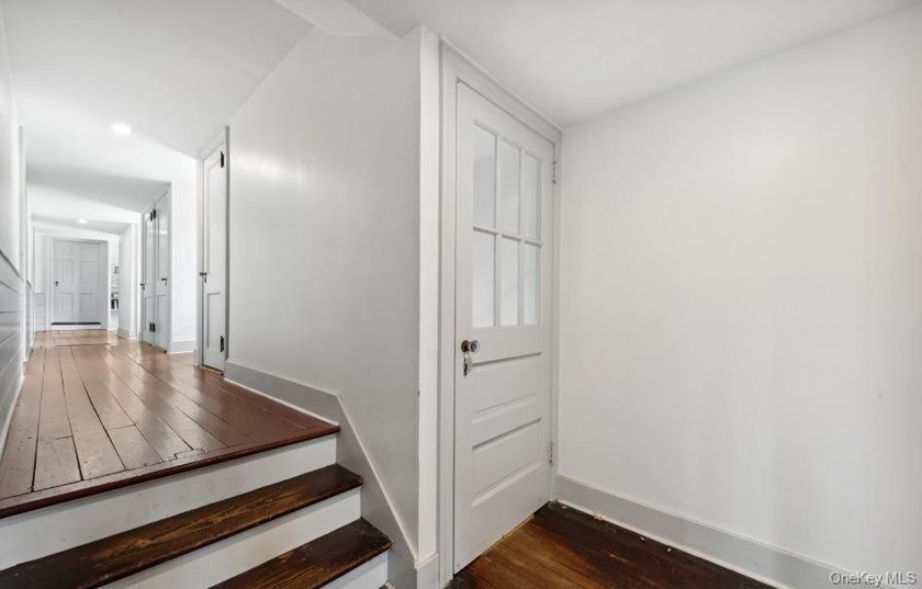 Welcome to 38 Landing Meadow Road, Smithtown. Nestled on almost - photo 10