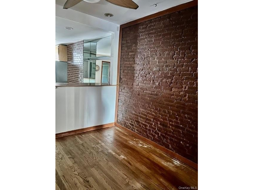 Fourth floor walk up on a tree lined block. Use of the backyard - photo 9