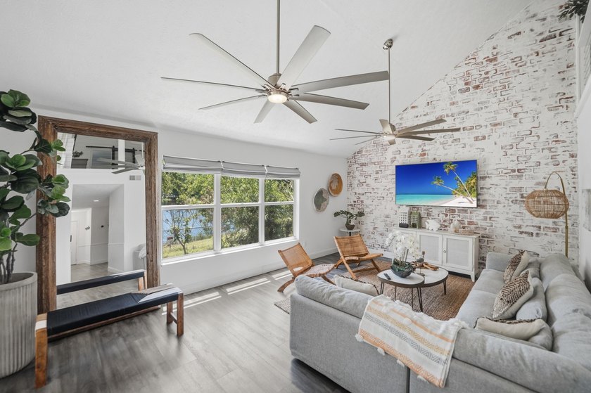 Rare lakefront sanctuary with endless possibilities! Own this - photo 17