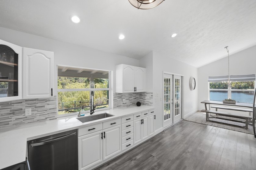 Rare lakefront sanctuary with endless possibilities! Own this - photo 25