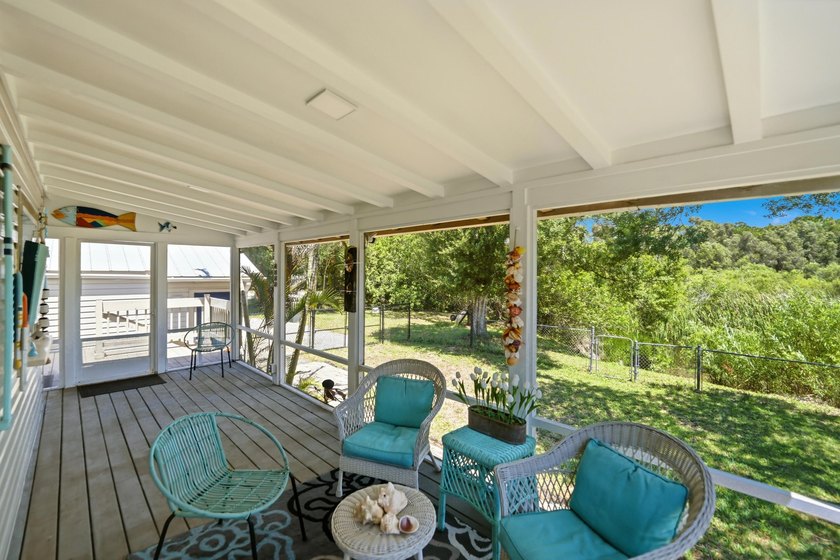Rare lakefront sanctuary with endless possibilities! Own this - photo 35