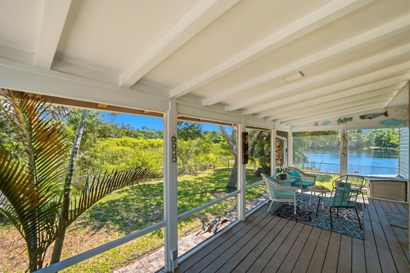 Rare lakefront sanctuary with endless possibilities! Own this - photo 36