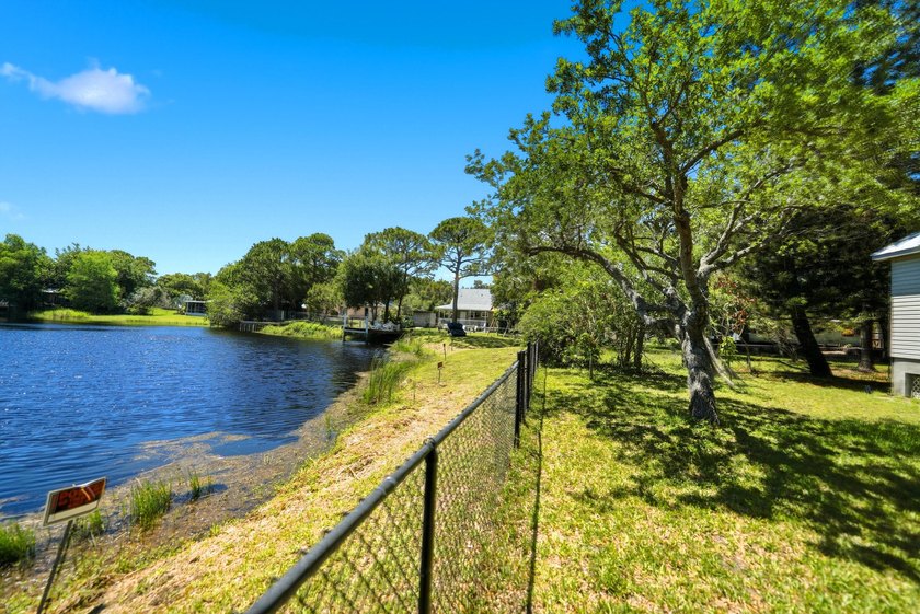 Rare lakefront sanctuary with endless possibilities! Own this - photo 50