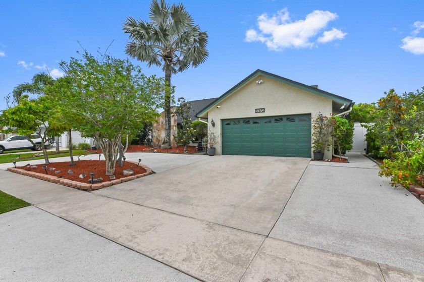 Welcome to 8372 Myakka Court, a beautifully updated 3-bedroom - photo 2