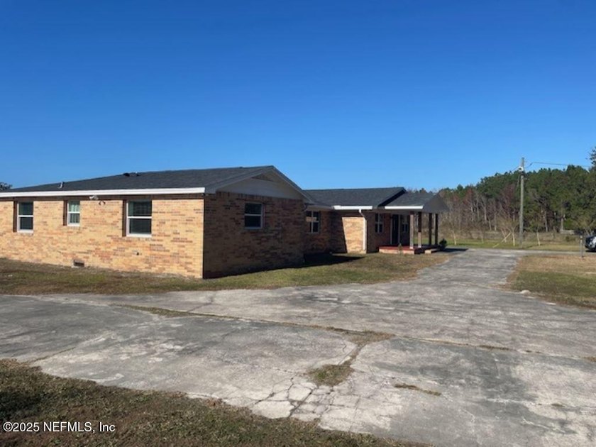 Nearly 8 Acres Fully Fenced Agricultural Ranch next to JAX - photo 3