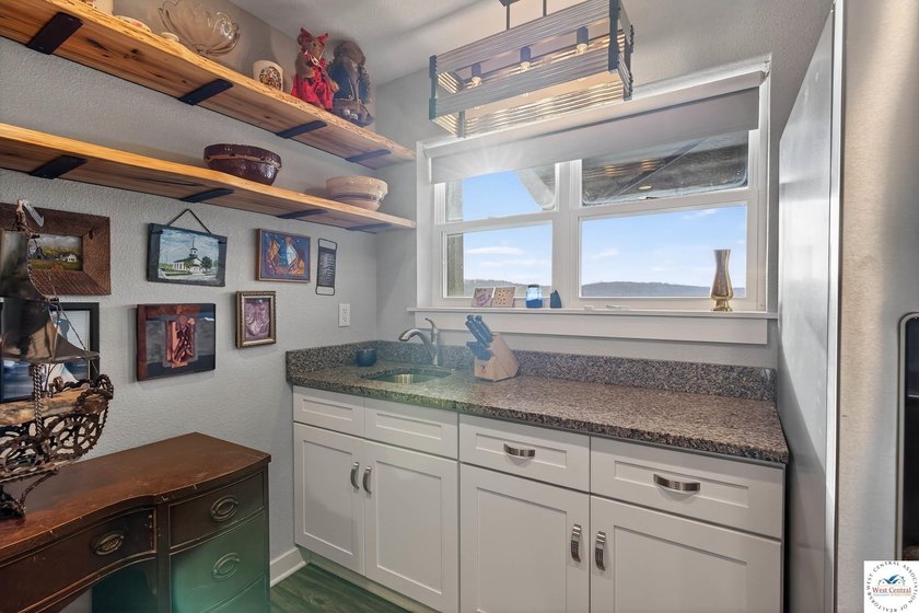 This 3-bedroom, 2.5-bath lakefront home offers over 2,000 square - photo 39