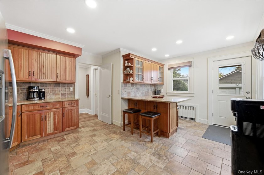 Prime location South of Montauk Highway! This spacious 4-bedroom - photo 16