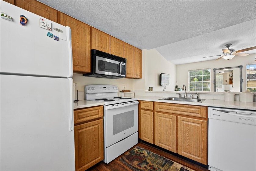 Beautifully updated 2BR/2BA first-floor condo in the desirable - photo 19