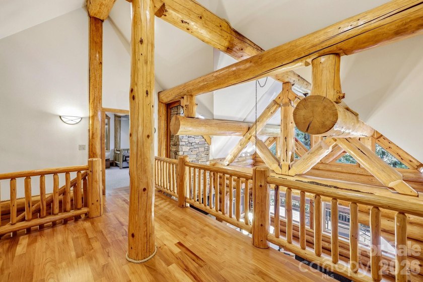 Stunning custom log home nestled on over 3 acres in the shadow - photo 22