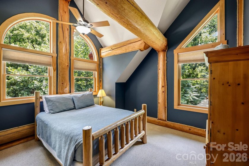 Stunning custom log home nestled on over 3 acres in the shadow - photo 24
