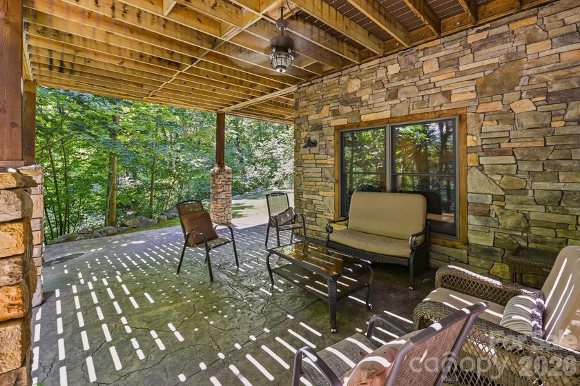 Stunning custom log home nestled on over 3 acres in the shadow - photo 36