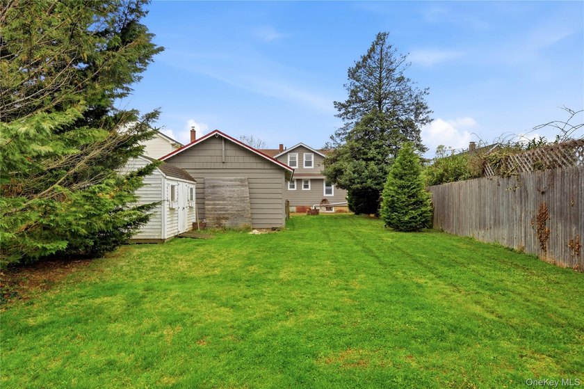 Prime location South of Montauk Highway! This spacious 4-bedroom - photo 37
