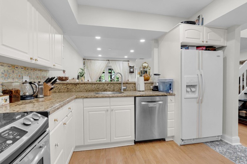 Welcome to this stunning townhouse in the desirable community of - photo 13