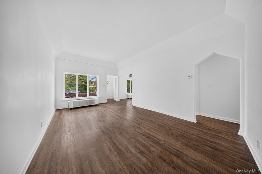 Perfectly situated in the heart of desirable Forest Hills, this - photo 3
