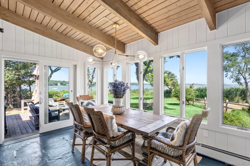 Enjoy breathtaking western-facing views across Three Mile Harbor - photo 7