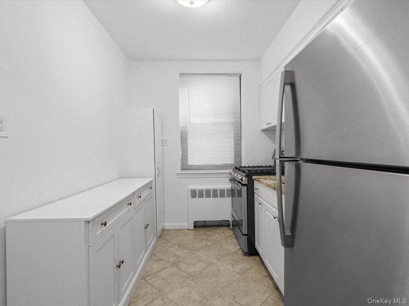 Welcome to this remarkably spacious, 540-square-foot residence - photo 8