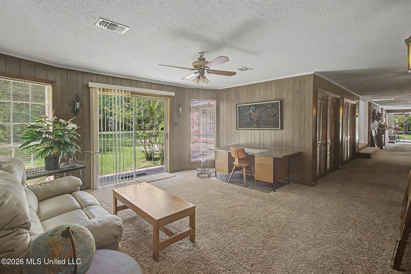 Nestled in a picturesque, park-like setting, this spacious 3,297 - photo 11