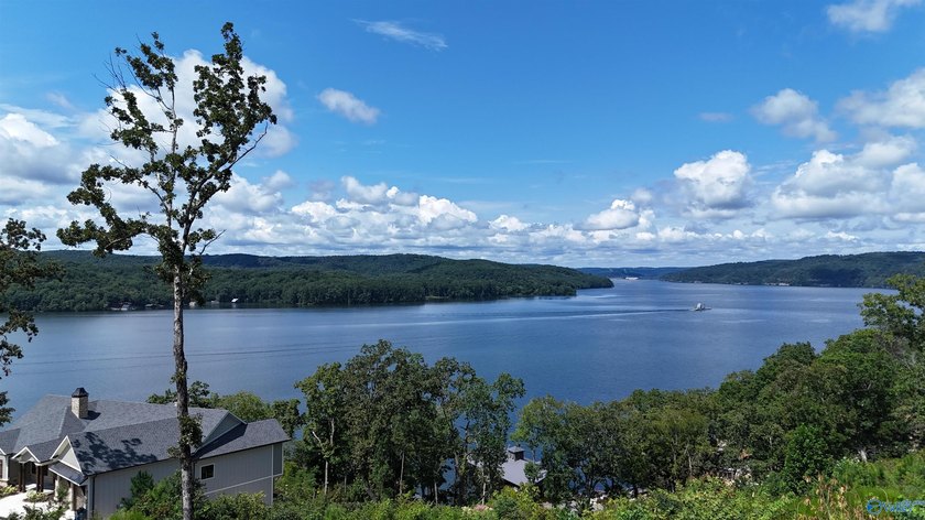 Experience lake living at The Reserve in this beautifully - photo 3