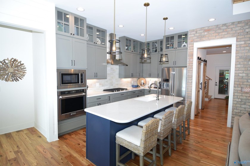 Experience lake living at The Reserve in this beautifully - photo 9