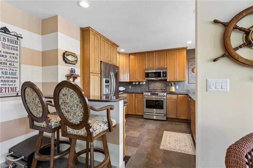 Step into this beautifully updated condo just in time for summer - photo 13