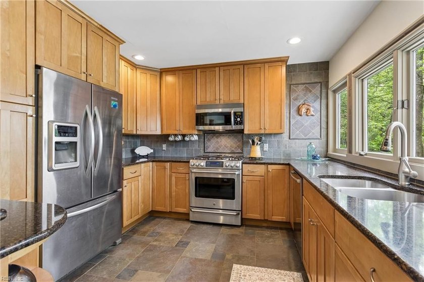 Step into this beautifully updated condo just in time for summer - photo 14