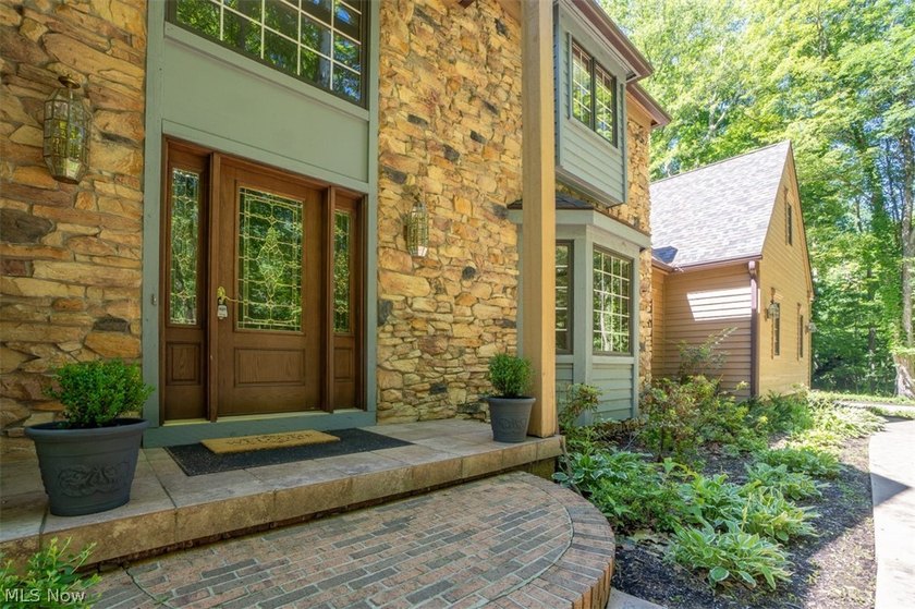 Tucked back on 5.09 wooded acres, this home offers the kind of - photo 3