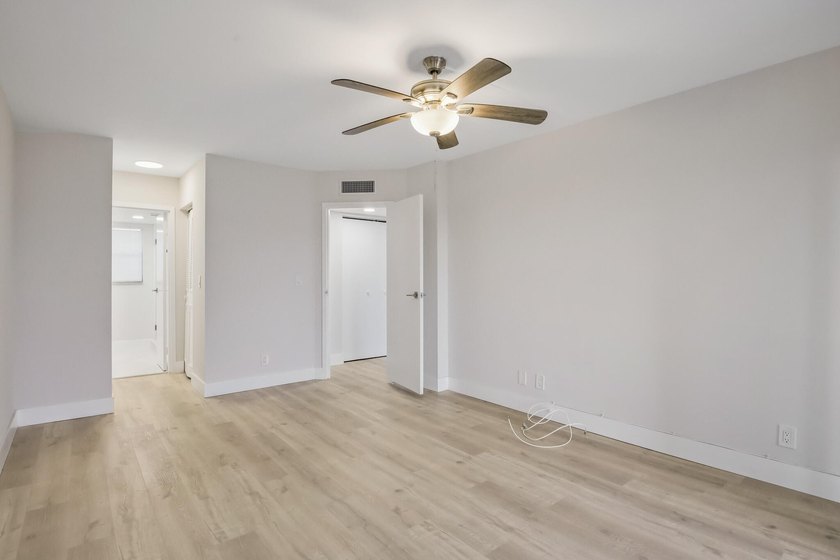 HURRY! THIS UPDATED, BRIGHT, CORNER CONDO IS PRICED BELOW MARKET - photo 13