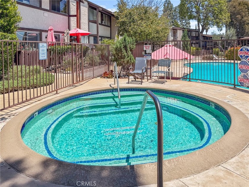 This RARE affordable corner townhome unit nestled in Miraleste - photo 40
