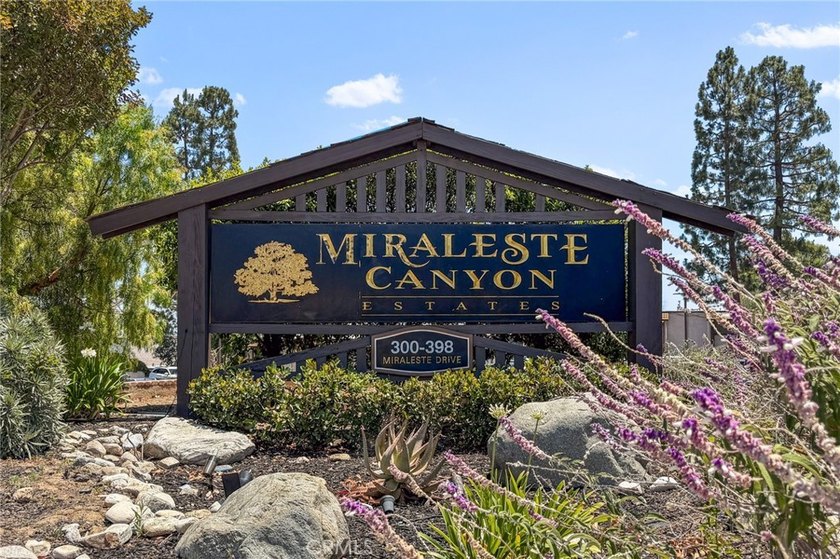 This RARE affordable corner townhome unit nestled in Miraleste - photo 45
