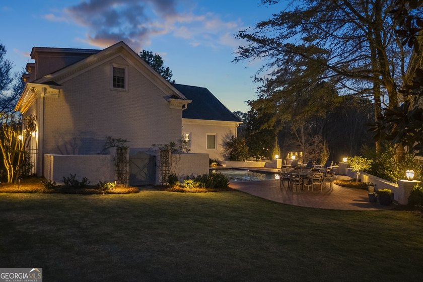 Situated within the prestigious Woodlands section of Chateau - photo 3