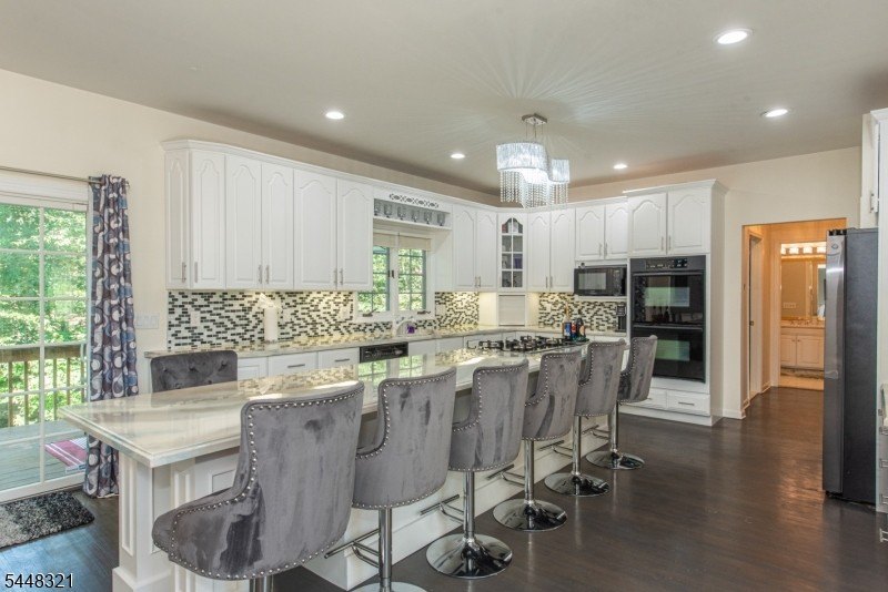 This stunning colonial is set on nearly 2 acres at the end of a - photo 11