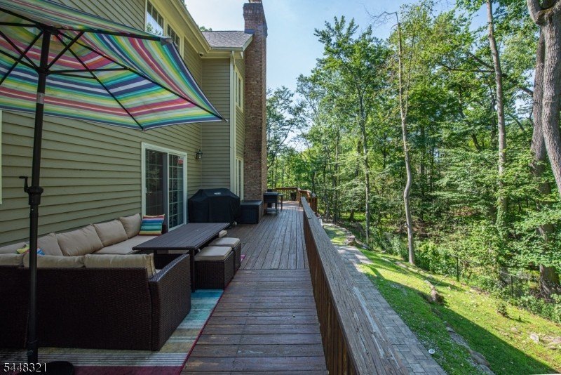 This stunning colonial is set on nearly 2 acres at the end of a - photo 35