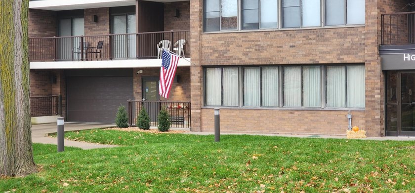 Welcome to Unit #104 at High Point - a beautifully designed - photo 2
