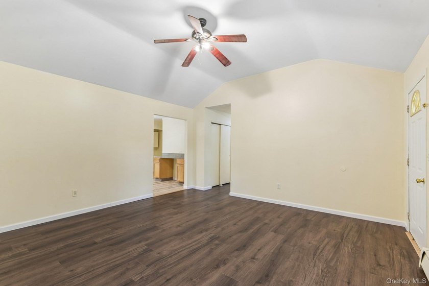 Tucked away on just over an acre in a private, wooded setting - photo 6