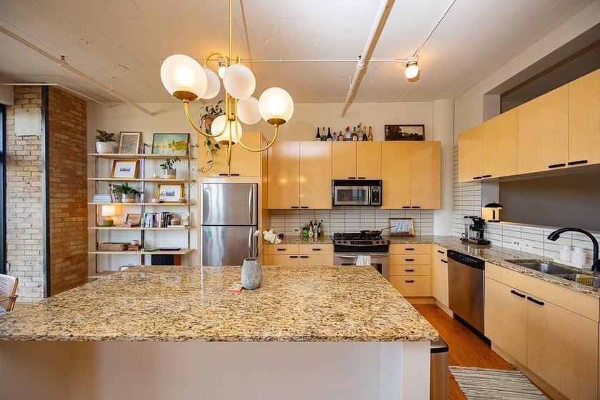 Step into urban sophistication with this stunning 2-bedroom - photo 3