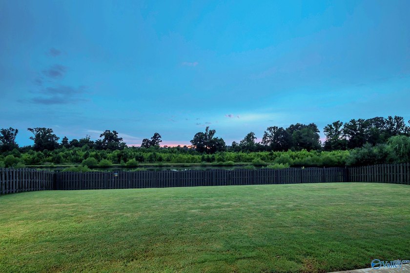 Stunning full brick home with breathtaking water and sunset - photo 4