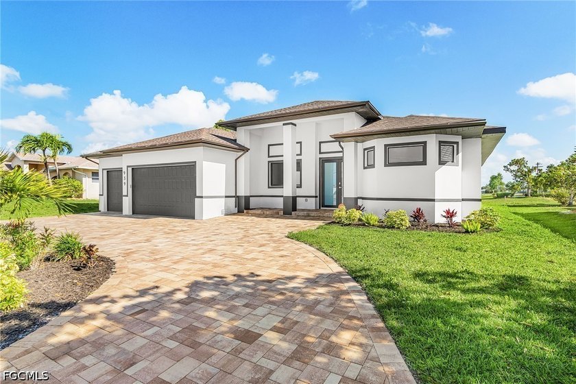This newly built contemporary ranch in SW Cape Coral offers - photo 3