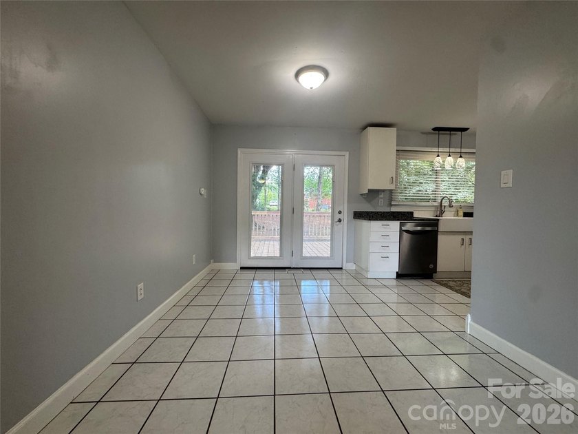 Welcome home to this inviting 3-bedroom, 1-bath residence - photo 13