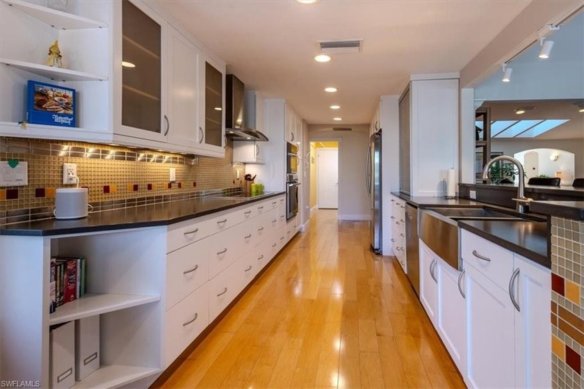 Discover this exceptional lakefront pool home in the highly - photo 10