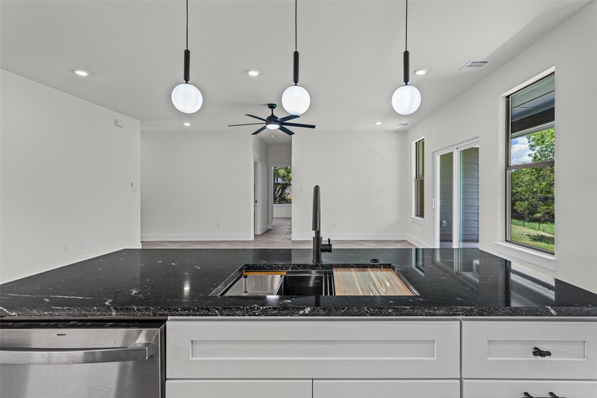 Discover this stunning brand-new 4-bedroom, 2-bathroom home in - photo 7